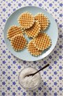 Waffles and sugar on plate — Stock Photo