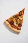 Slice of Cajun pizza — Stock Photo