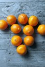 Mandarins on a wooden table — Stock Photo