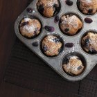 Freshly baked mulberry muffins — Stock Photo