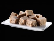 Closeup view of fudge pieces on plate — Stock Photo