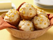 Muffins in straw basket — Stock Photo