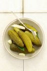 Bowl of pickled gherkins — Stock Photo