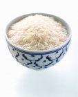 Неприготовленный белый рис — стоковое фото
