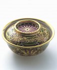 Closeup view of decorative Asian pot with lid — Stock Photo