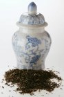 Dry tea with tea caddy — Stock Photo