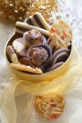 Chocolate truffles and florentines — Stock Photo