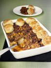 Mince cobbler with scones — Stock Photo