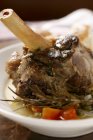 Braised lamb shank with vegetables — Stock Photo
