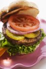 Homemade hamburger with gherkins — Stock Photo