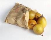 Paper bag of  Passa Crassana pears — Stock Photo