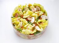 Closeup view of lettuce salad with shrimps and mushrooms — Stock Photo