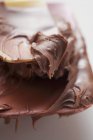 Mixing spoon with chocolate — Stock Photo
