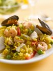 Paella with mussels on plate — Stock Photo