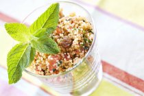 Couscous tabbouleh with vegetables — Stock Photo