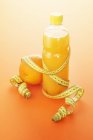 Orange juice and measure — Stock Photo