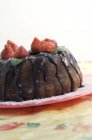 Ring cake with chocolate sauce — Stock Photo
