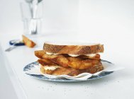 Chip butty on plate — Stock Photo