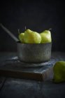 Pears in old metal pot — Stock Photo