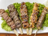 Grilled skewers with seeds — Stock Photo