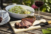 Grilled sirloin with cabbage salad — Stock Photo