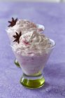 Closeup view of rhubarb fool with anise stars in glasses — Stock Photo