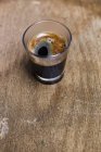 Glass of black coffee — Stock Photo