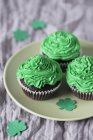 Cupcakes with green buttercream — Stock Photo