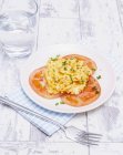 Scrambled eggs with tomatoes — Stock Photo