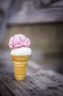 Scoops of coconut and strawberry ice cream — Stock Photo