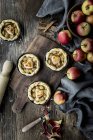 Apple tartlets decorated with hearts — Stock Photo