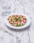 Rocket salad with crayfish and chilli — Stock Photo