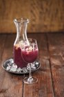 Sangria with Sake and red plums — Stock Photo