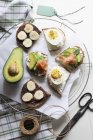 Open sandwiches with toppings — Stock Photo