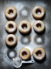 Caramel doughnuts with sugar icing — Stock Photo