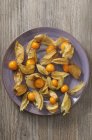 Physalis fruits on a plate — Stock Photo