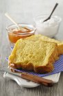 Closeup view of French toasts with marmalade and cream — Stock Photo