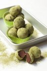 Chocolate matcha truffles — Stock Photo