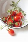 Cherry tomatoes in bowl — Stock Photo