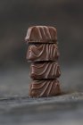 Stack of four pralines — Stock Photo