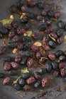 Dried olives with garlic — Stock Photo