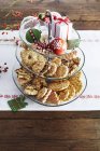 Christmas biscuits on cake stand — Stock Photo