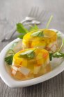 Closeup view of Surimi in aspic with herb — Stock Photo