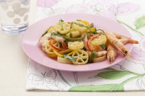 Wheel pasta with prawns — Stock Photo