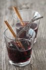 Dried plums in red wine and rum — Stock Photo