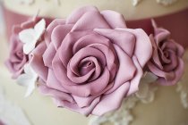 Cake decorated with marzipan roses — Stock Photo