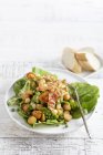 Salad with fried potatoes and bacon — Stock Photo