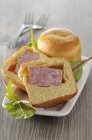 Brioche filled with sausage — Stock Photo