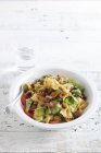 Farfalle pasta salad with vegetables — Stock Photo
