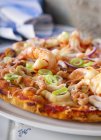 Pizza with seafood on plate — Stock Photo